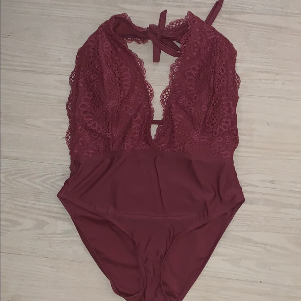 Large Cut open back one piece.